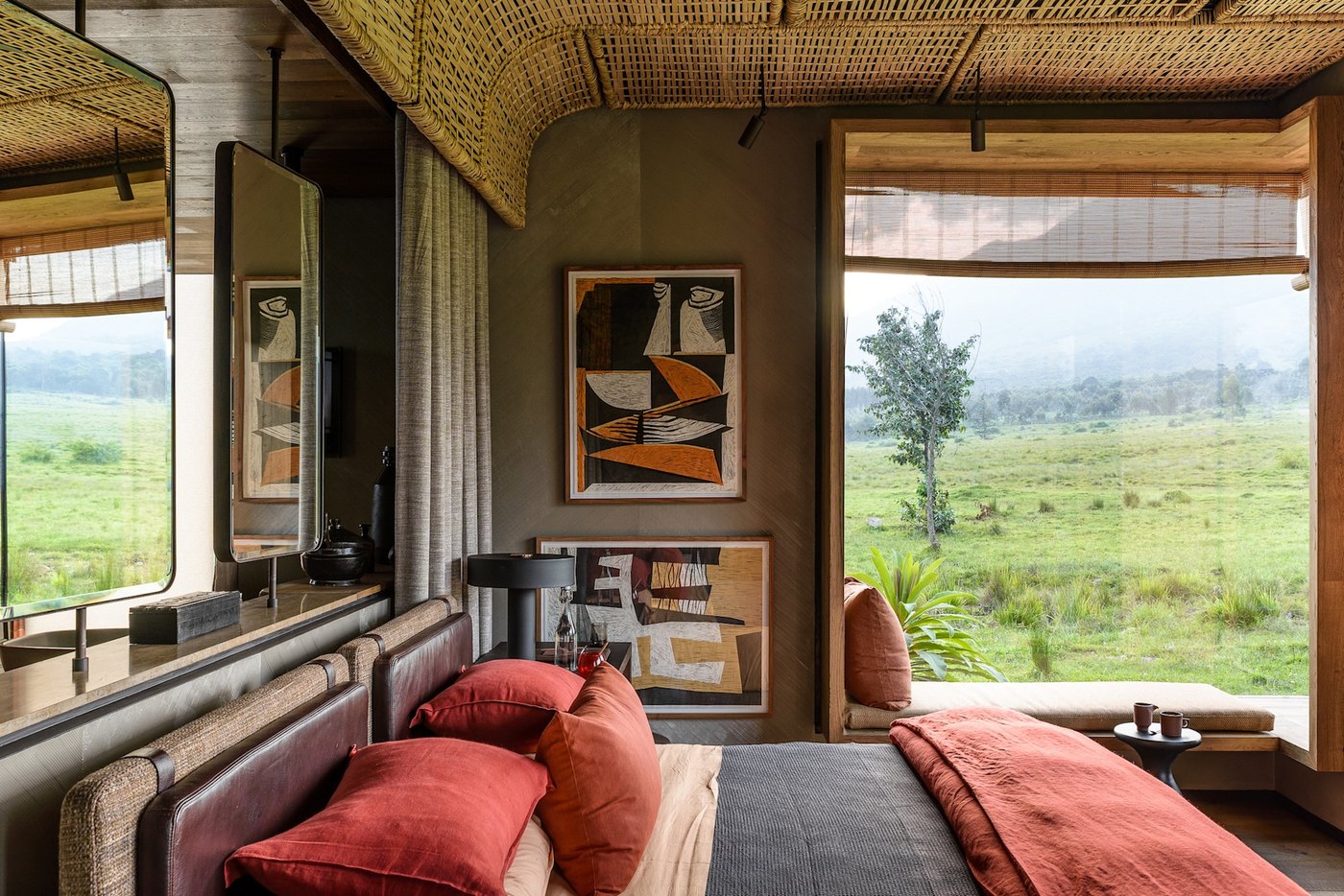 Singita Kwitonda Lodge glass-walled suite on the edge of Volcanoes National Park, Rwanda