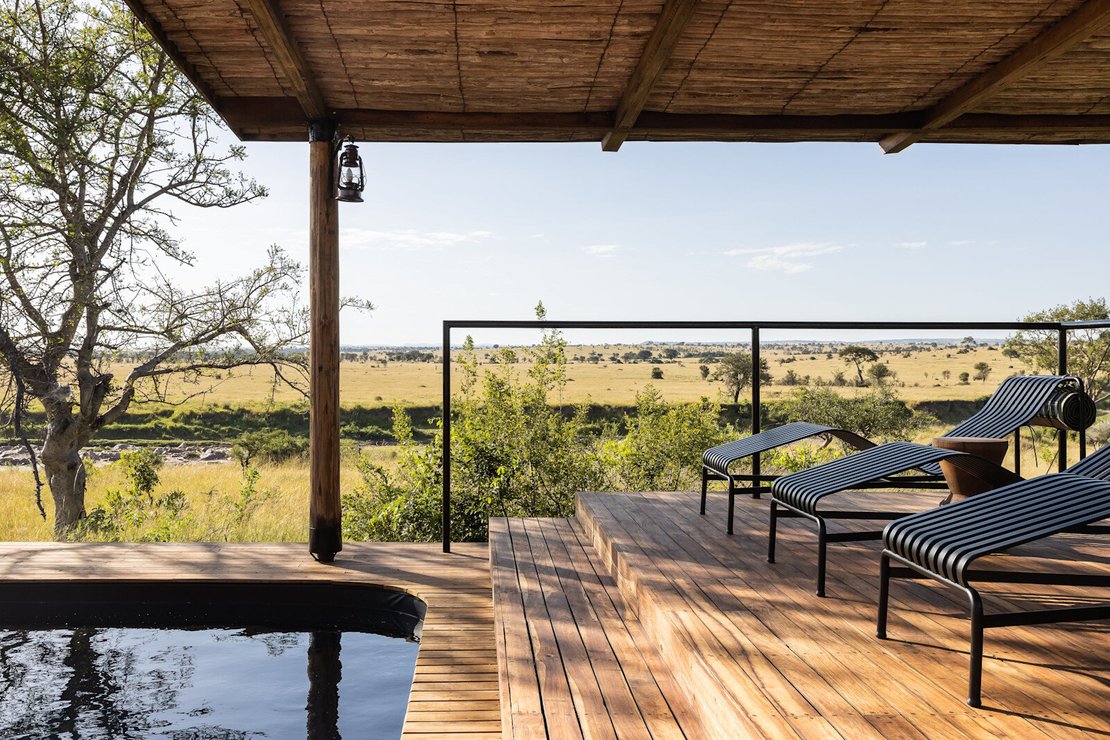 Plunge pool and sun deck at Singita Mara River Tented Camp overlooking the Lamai Triangle