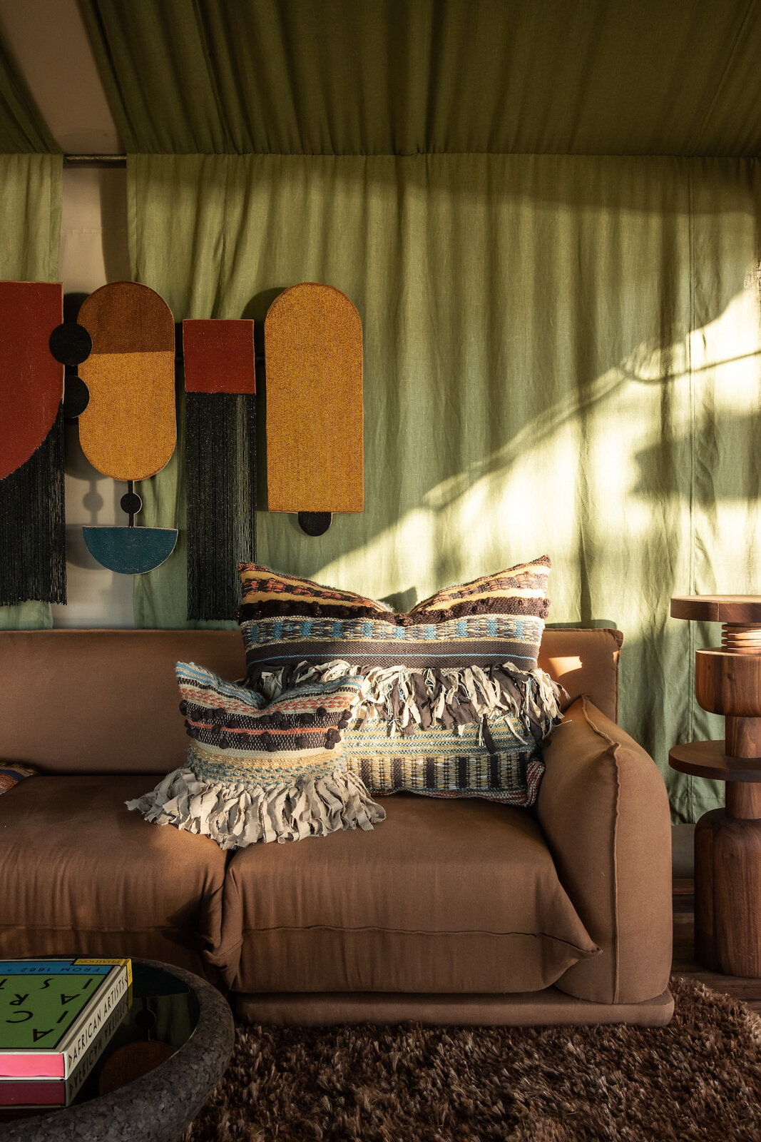 Main lounge interior at Singita Mara River Tented Camp with contemporary African design