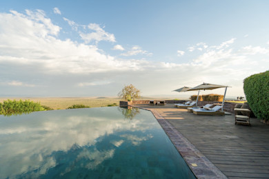 Private infinity pool at Singita Sasakwa cottage with sweeping Serengeti views