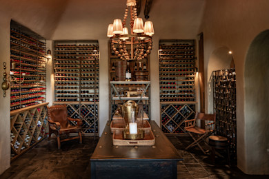 Wine tasting setup at Singita Sasakwa Lodge with curated South African wines