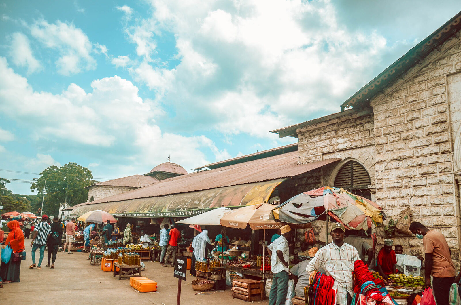 Darajani Market interior with fresh fish and local vendors, Stone Town