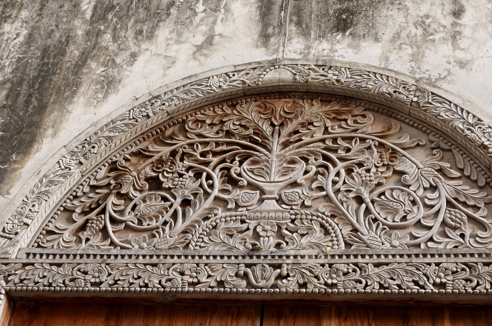 Indian design carved door with floral motifs, Stone Town Zanzibar