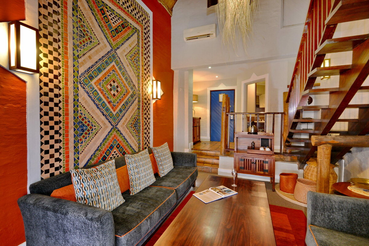 Victoria Falls Safari Lodge — plunge pool and lounge area