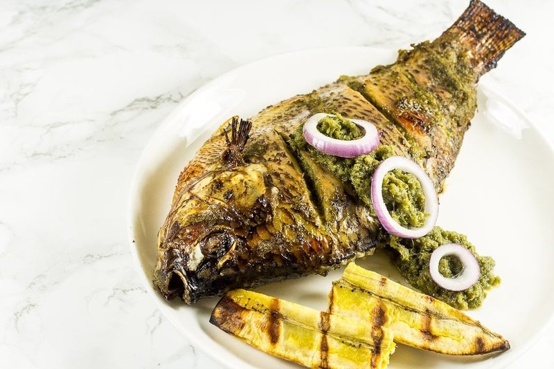 Whole grilled Lake Tanganyika tilapia at World Beach