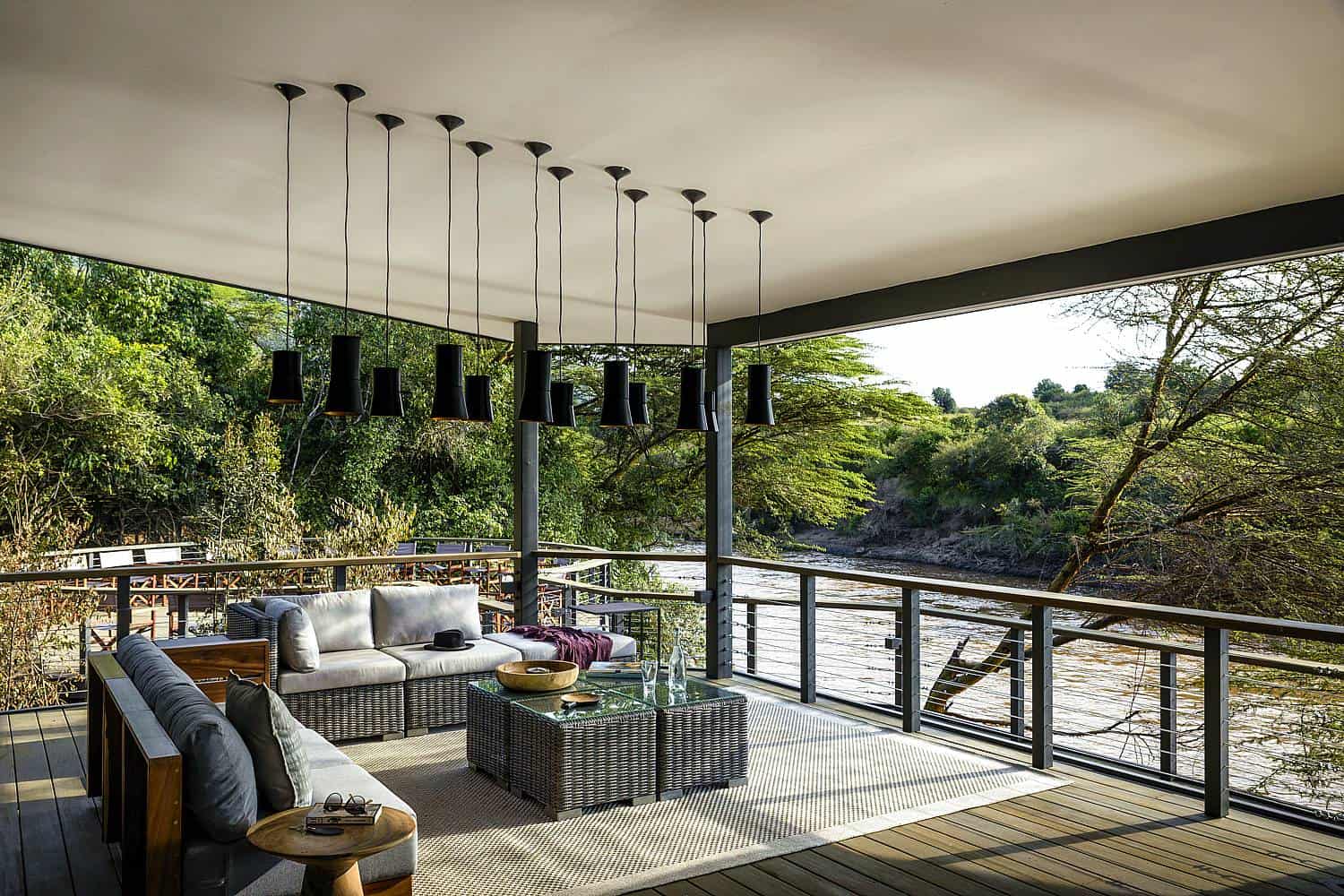 Sanctuary Olonana riverside deck and lounge overlooking the Mara River in the Mara North Conservancy